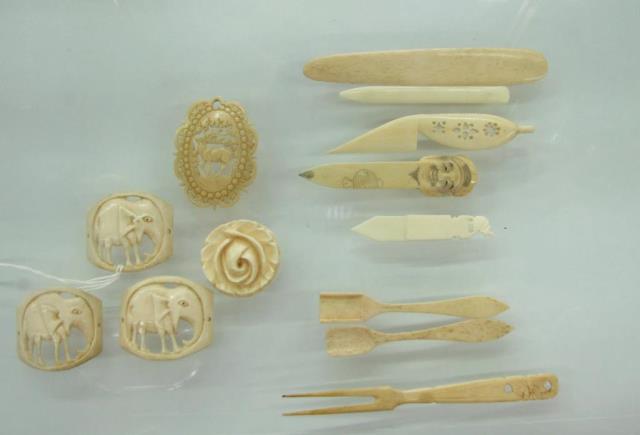 Appraisal: Thirteen ivory accessories fork two salt spoons five letter openers