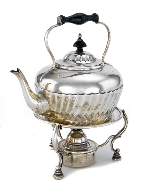 Appraisal: A VICTORIAN TEA KETTLE of half spirally fluted form on