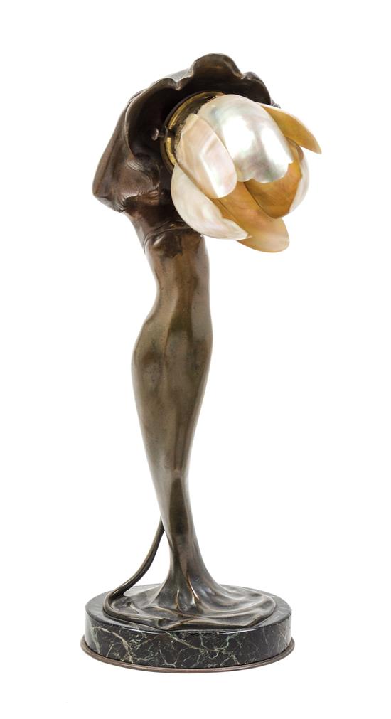 Appraisal: Sale Lot An Art Nouveau Bronze and Shell Figural Lamp