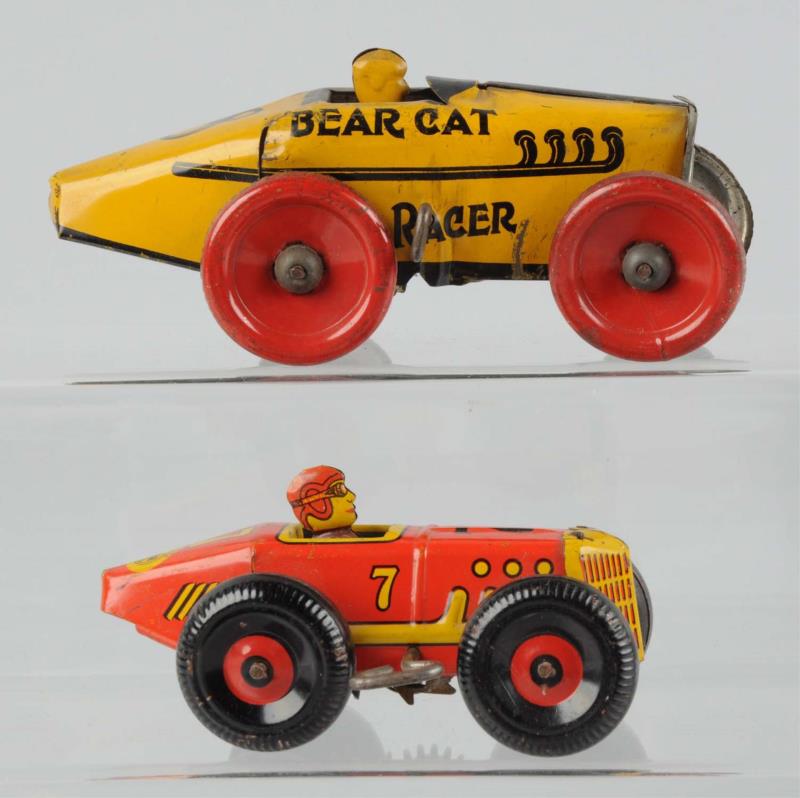 Appraisal: Lot Of Tin Litho Wind - Up Race Cars Both