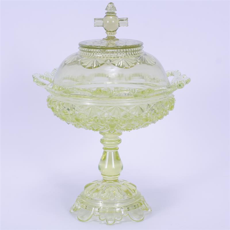 Appraisal: Belmont Glass Pedestal Covered Compote Pattern Daisy Button with Scalloped