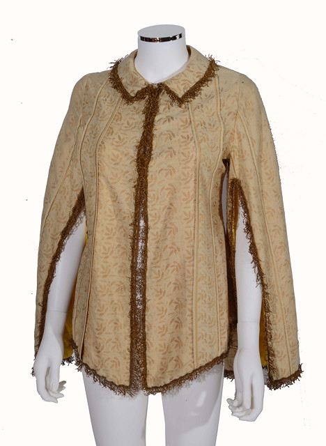 Appraisal: A VINTAGE GOLD COLOURED JACKET gold fringe detailing gold coloured