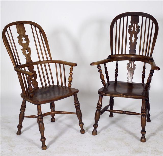 Appraisal: EARLY th CENTURY ELM WINDSOR CHAIR the hoop back centred