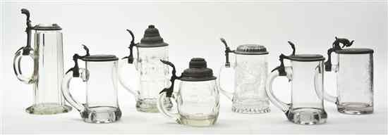 Appraisal: A Group of Seven Pewter Mounted Glass Steins each of