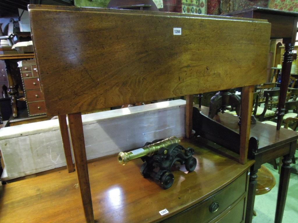 Appraisal: A th century mahogany Pembroke table fitted with one real