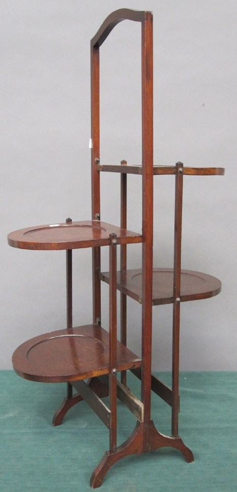 Appraisal: MUFFINIER Mahogany having four tiers