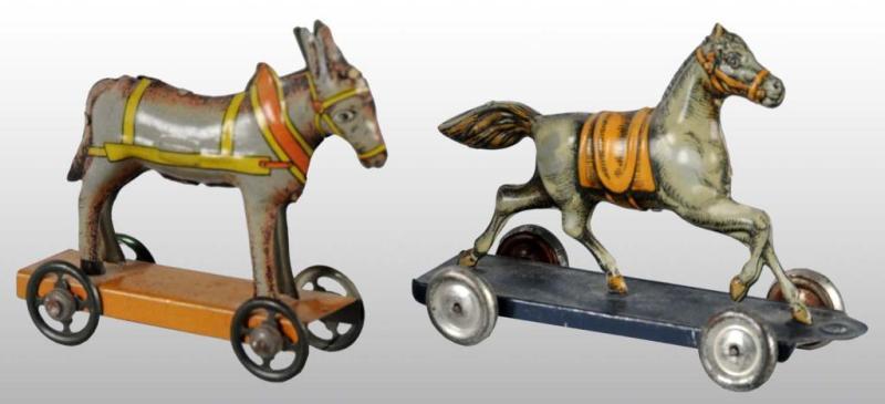 Appraisal: Lot of Tin Litho Animal Penny Toys Description German Both