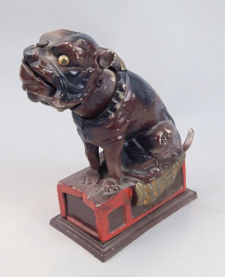 Appraisal: Mechanical Bulldog bank in brown with red highlights with a