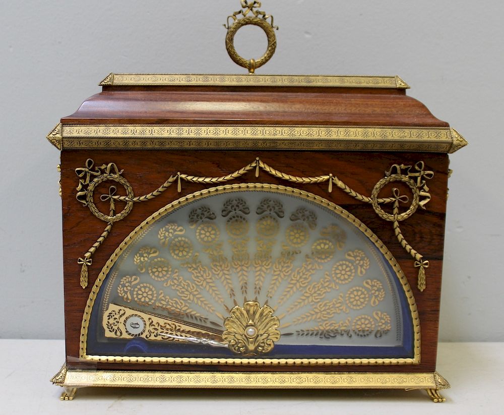 Appraisal: FABERGE Imperial Fan Clock A fan clock by Thwaites and