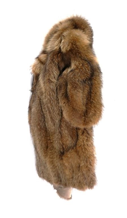 Appraisal: Long length natural fox fur coat having subtle shades of