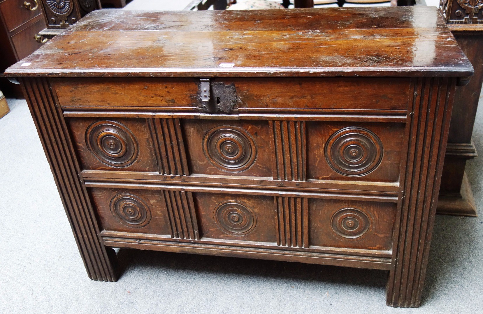 Appraisal: A th century oak coffer the chipwork plank top over