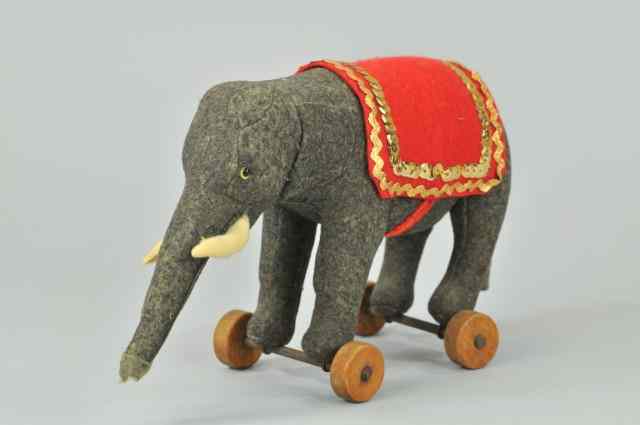 Appraisal: STEIFF ELEPHANT PULL-TOY c depicted in grey felt body white