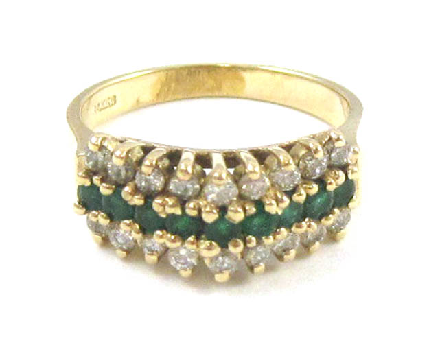 Appraisal: EMERALD DIAMOND AND FOURTEEN KARAT GOLD RING set with nine