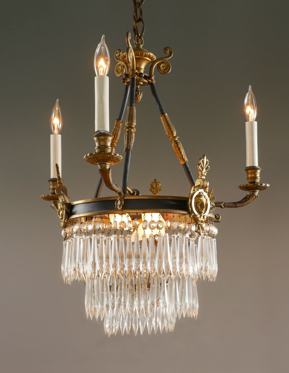 Appraisal: GILT METAL AND CRYSTAL CHANDELIER CIRCA S Gilt black painted