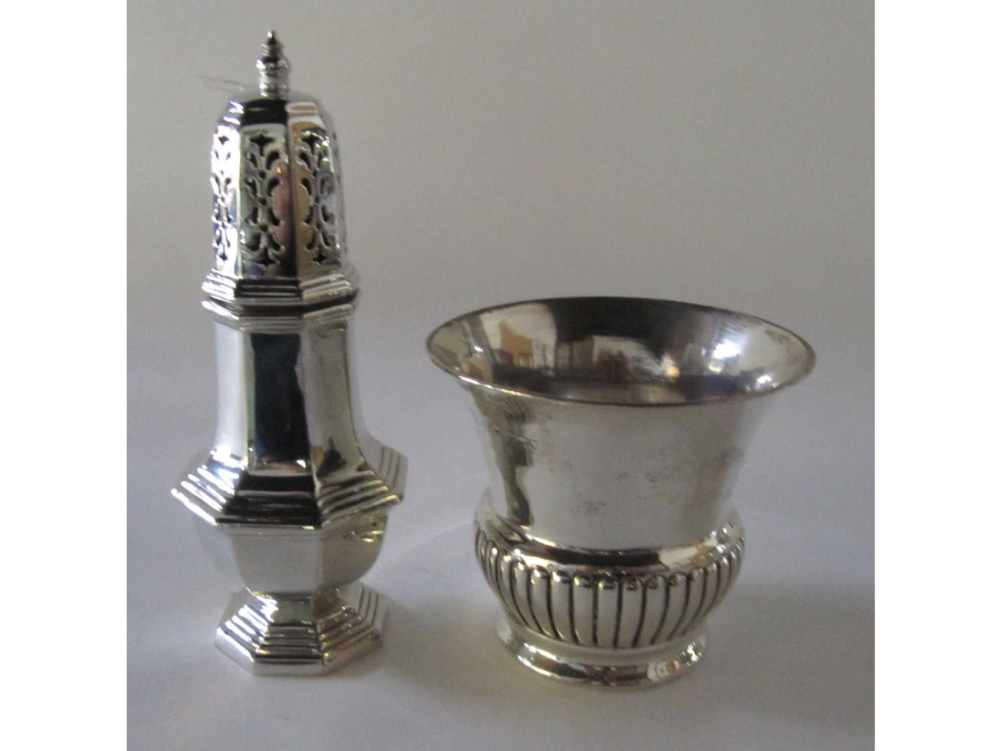 Appraisal: A lot comprising a silver sugar castor and a silver