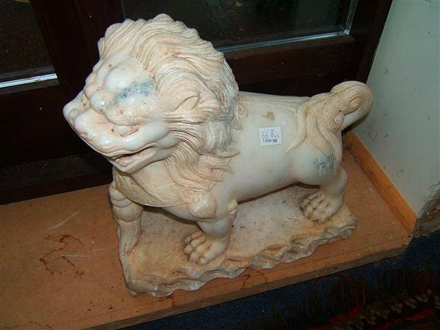 Appraisal: Two carved Oriental marble lions