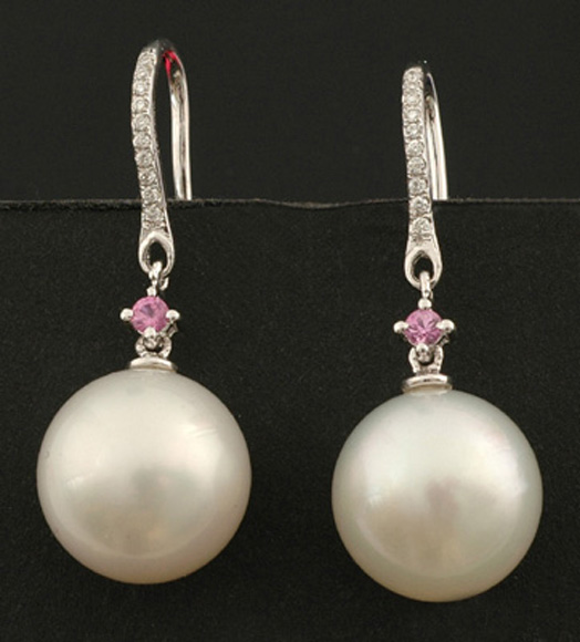 Appraisal: A pair of South Sea pearl diamond and sapphire earrings