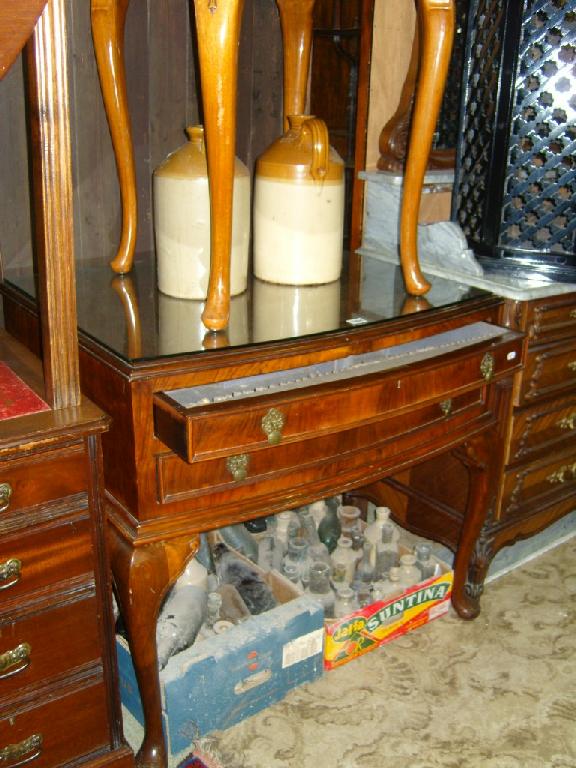 Appraisal: A substantial walnut cutlery canteen fitted with two drawers the