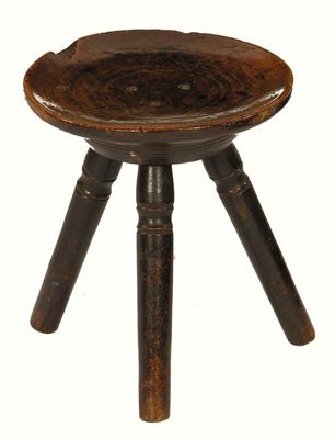 Appraisal: A th century turned sycamore milking stool in cm h