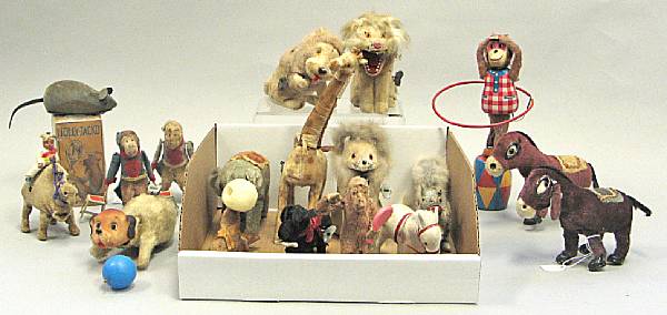 Appraisal: Comical grouping of felt Japanese toys Grouping of playful windups