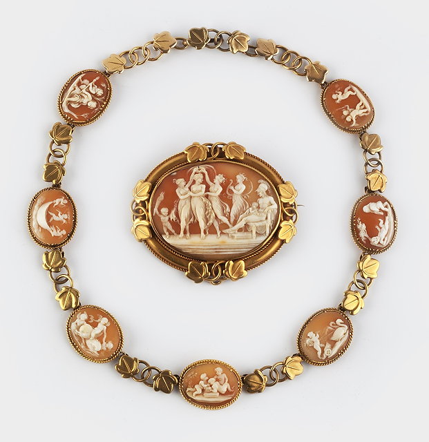 Appraisal: A TH CENTURY SHELL CAMEO COLLAR NECKLACE AND BROOCH ENSUITE