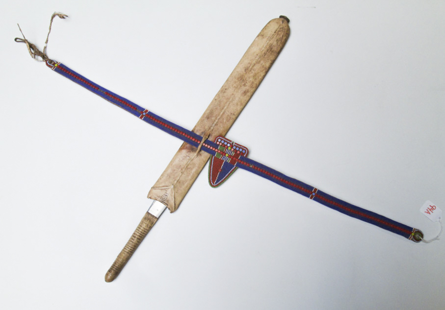 Appraisal: EASTERN AFRICAN MAASAI SWORD AND BELT the short sword with