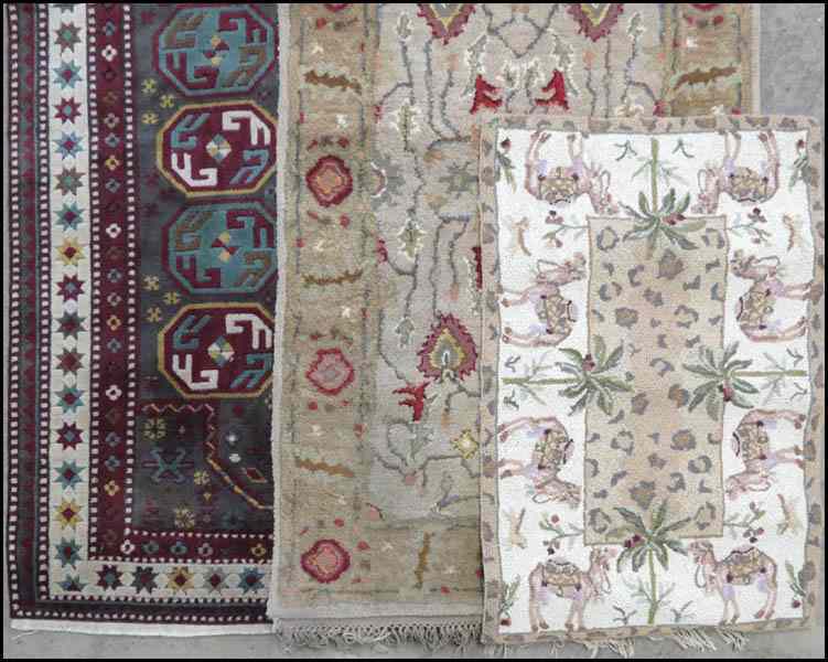 Appraisal: PERSIAN WOOL RUG Together with a contemporary rug and a