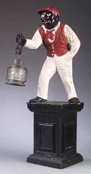 Appraisal: An Antique Cast Iron Figural Jockey Lantern the striding figure