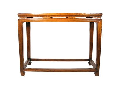 Appraisal: A Chinese nanmu rectangular side table with an openwork frieze