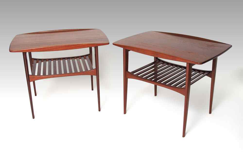 Appraisal: PAIR FRANCE DAVERKOSEN DANISH MODERN SIDE TABLES Teak two tier