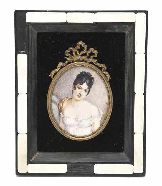 Appraisal: A Portrait Miniature on Ivory signed J Laguel depicting a