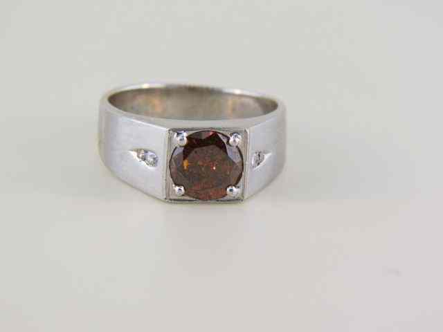 Appraisal: Diamond Ring carat round brilliant fancy orange brown diamond in