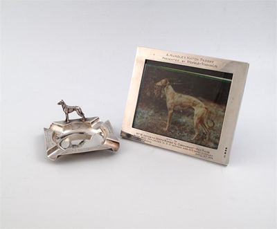 Appraisal: Greyhound racing interest a presentation silver ashtray and photograph frame