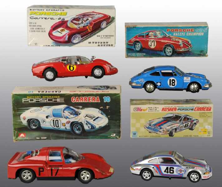 Appraisal: Lot of Tin Race Car Battery-Operated Toys Description Japanese Working