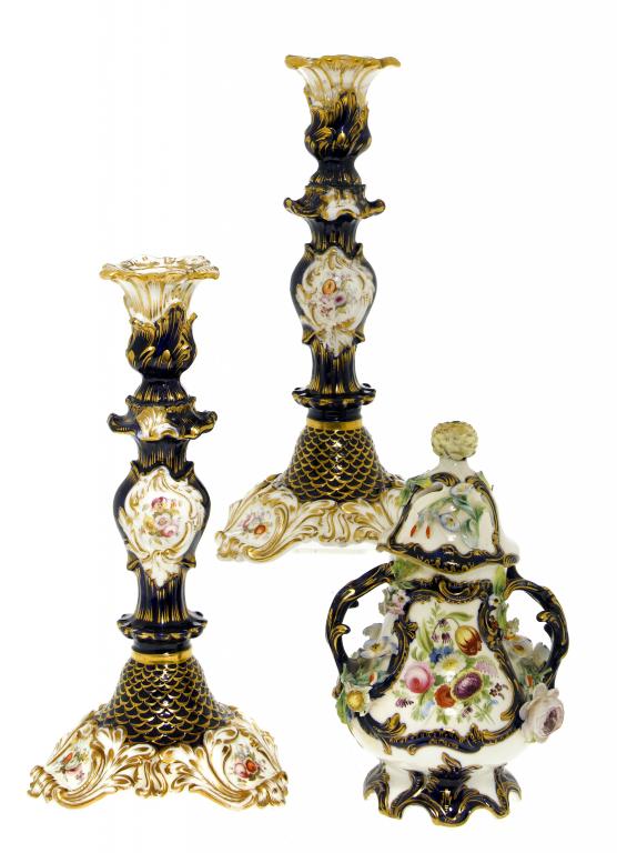 Appraisal: A PAIR OF COALPORT REVIVED ROCOCO COBALT GROUND CANDLESTICKS painted