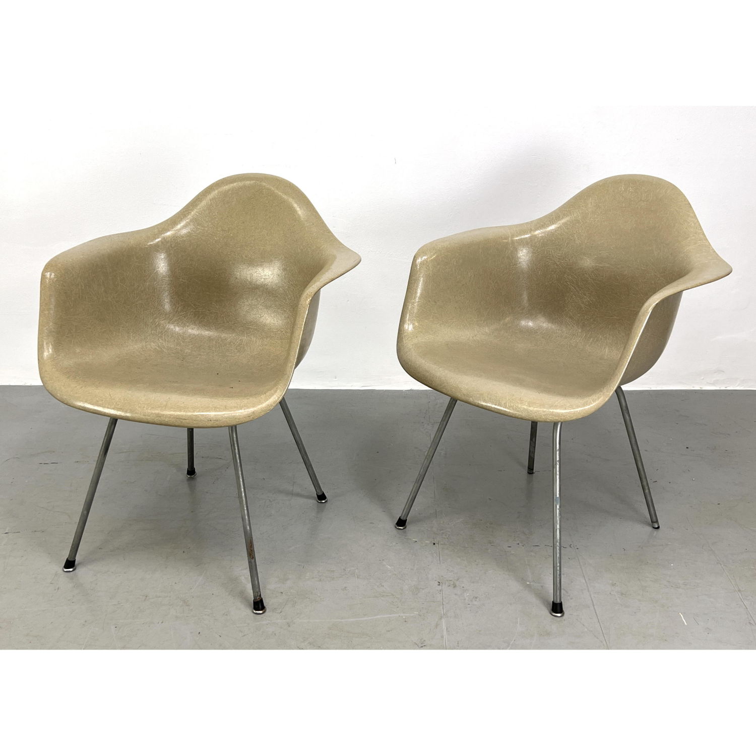 Appraisal: Pair Eames Herman Miller Shell Arm Chairs Fiberglass Dimensions H