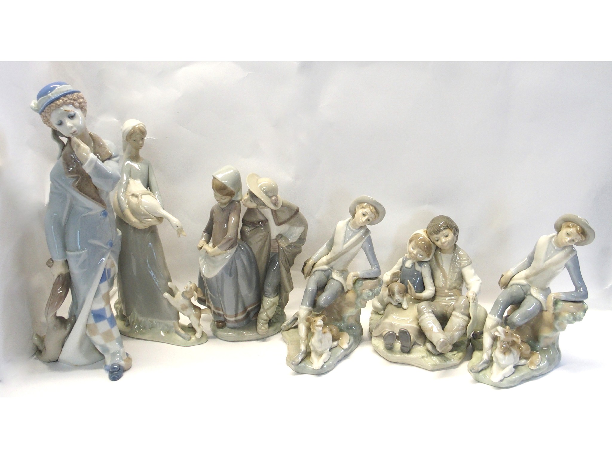 Appraisal: Six Lladro figures including boy girl and puppy girl and