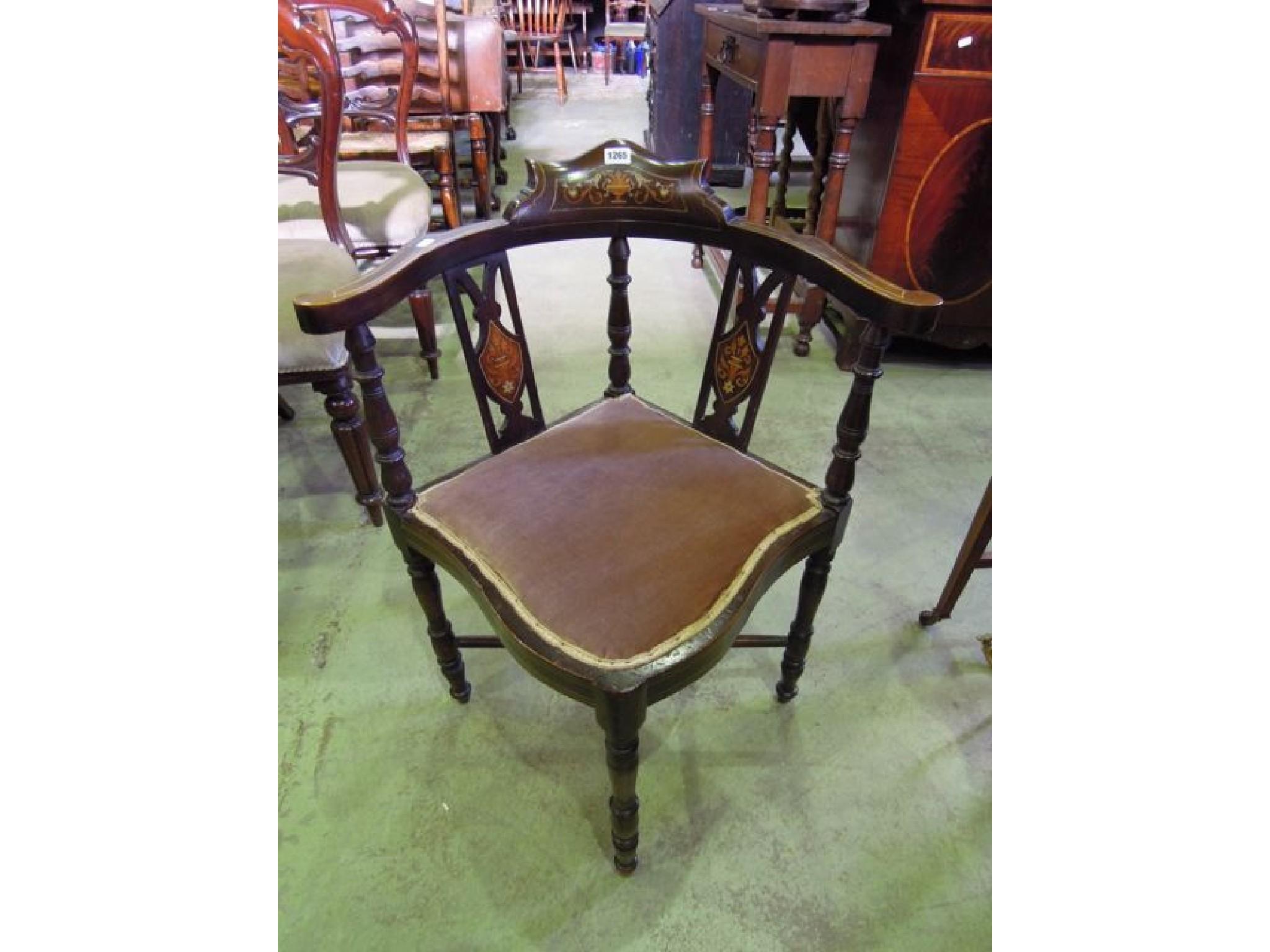 Appraisal: An inlaid Edwardian corner chair with flowering urn detail pierced