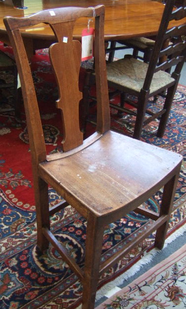 Appraisal: A set of six George III elm dining chairs with