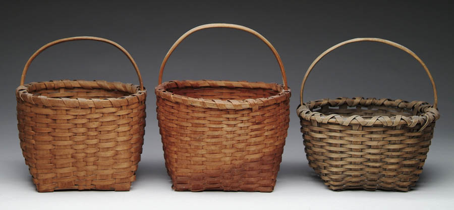 Appraisal: THREE HANDLED ROUND BASKETS All with fixed half round handles