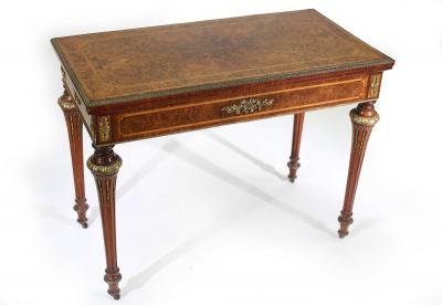 Appraisal: A Victorian burr walnut and gilt metal mounted card table