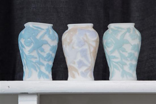 Appraisal: THREE CONSOLIDATED GLASS RELIEF DECORATED HUMMINGBIRD VASES Each measuring ''