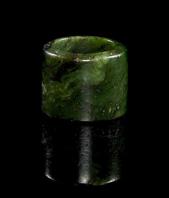 Appraisal: A Spinach Jade Archer's Ring Diameter inches A Spinach Jade