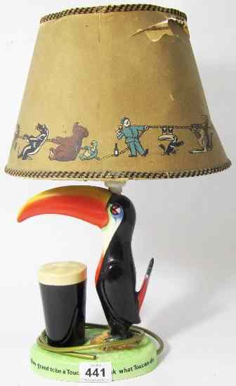 Appraisal: Carlton Ware Original 's Guiness Advertising Lamp Modelled as a