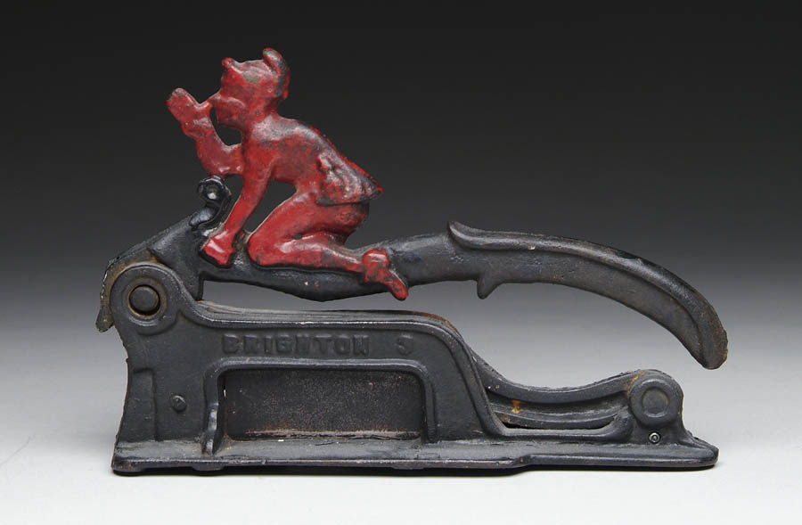 Appraisal: CAST IRON FIGURAL TOBACCO CUTTER Figural Little Imp Commercial Tobacco