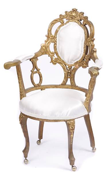 Appraisal: An Italian Rococo style giltwood armchair height in width in