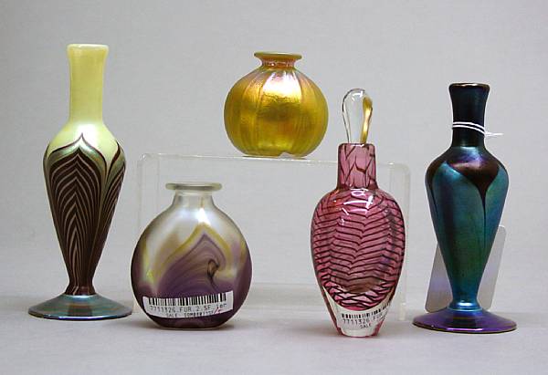 Appraisal: Five California art glass perfume bottles with stoppers Comprising baluster