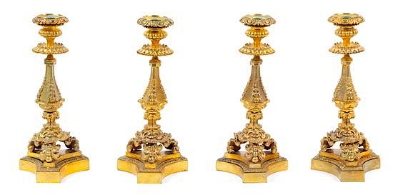 Appraisal: Four French Gilt Bronze Candlesticks Height inches Four French Gilt