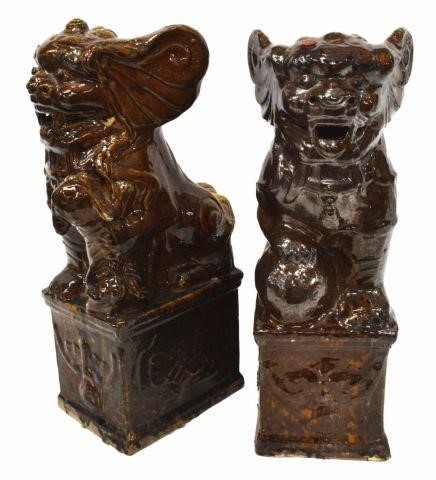 Appraisal: pair Large Chinese porcelain Foo Dogs each glazed brown with