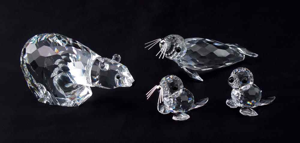 Appraisal: SWAROVSKI CRYSTAL FIGURINES KINGDOM OF ICE SNOW to include POLAR